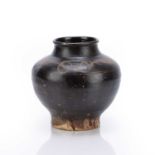 Black nian cizhou-type jar Chinese, 12/13th Century painted with a stylised pattern around the