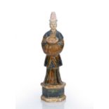 Tall sancai glazed Mingqi Chinese, Tang or Ming dynasty the body decorated with a sancai glaze,