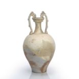 Cream glazed amphora vase Chinese, Tang dynasty with stylised dragon handles, with a thin glaze in