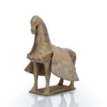 Grey pottery horse Chinese, probably Northern Wei period with traces of red pigment, modelled with