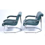 Girsberger Pair of armchairs, circa 1970 the green leather upholstered seats on tubular chrome