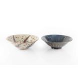 Robert Goldsmith (Contemporary) Two bowls decorated with lustre 28cm diameter; and two Chris