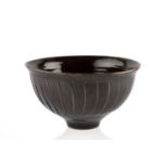 David Leach (1911-2005) Large bowl tenmoku with fluted sides impressed potter's seal 15.8cm high,