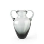 Manner of Wilhelm Wagenfeld (1900-1990) Handled vase, circa 1950 pewter coloured glass 33cm high.