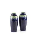 Elizabeth Amour for Bough Pottery A pair of Arts & Crafts vases, 1923 with blue glaze and a single