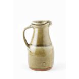 Richard Batterham (1936-2021) Jug green ash glaze 26cm high.