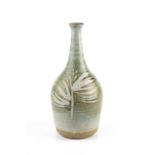 Michael Casson (1925-2003) Bottle vase pale blue glaze decorated with two leaf motifs impressed