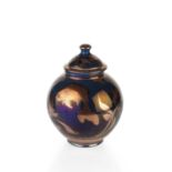 Jonathan Chiswell Jones (b.1944) Lidded jar reduction fired lustre depicting a fish painted potter's