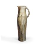 Nic Collins (b.1958) Large jug wood-fired 64.5cm high.Pits and bubbles to the glaze all over as