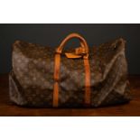 A Louis Vuitton Duffel bag, code VI 0990, 60cm wide.Some stains and marks
