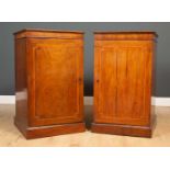 A pair of 19th century mahogany and satinwood crossbanded pedestals each with single doors, one