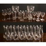 A part suite of 20th century glassware to include wine glasses and beakers together with a pair of