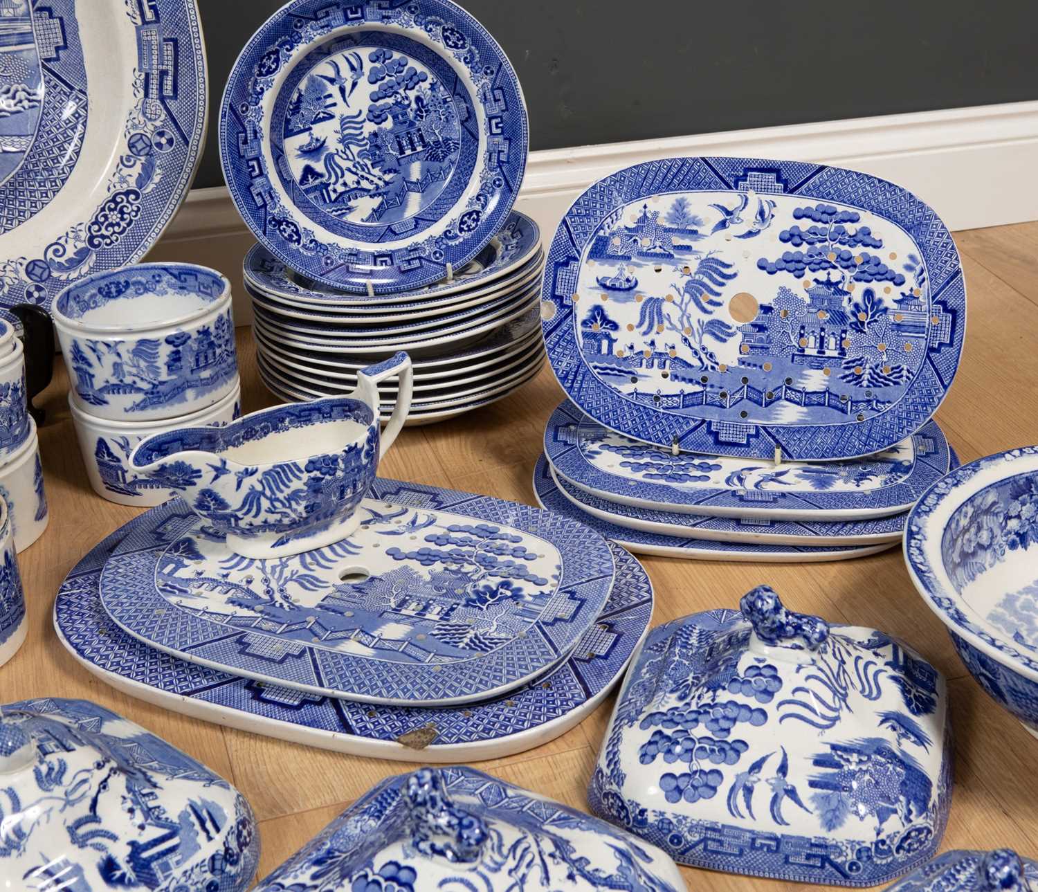 A collection of antique and later Staffordshire Willow Pattern china to include tureens, a large - Image 4 of 7