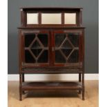 Early 20th century mahogany side cabinet the raised triple mirrored back having cluster column