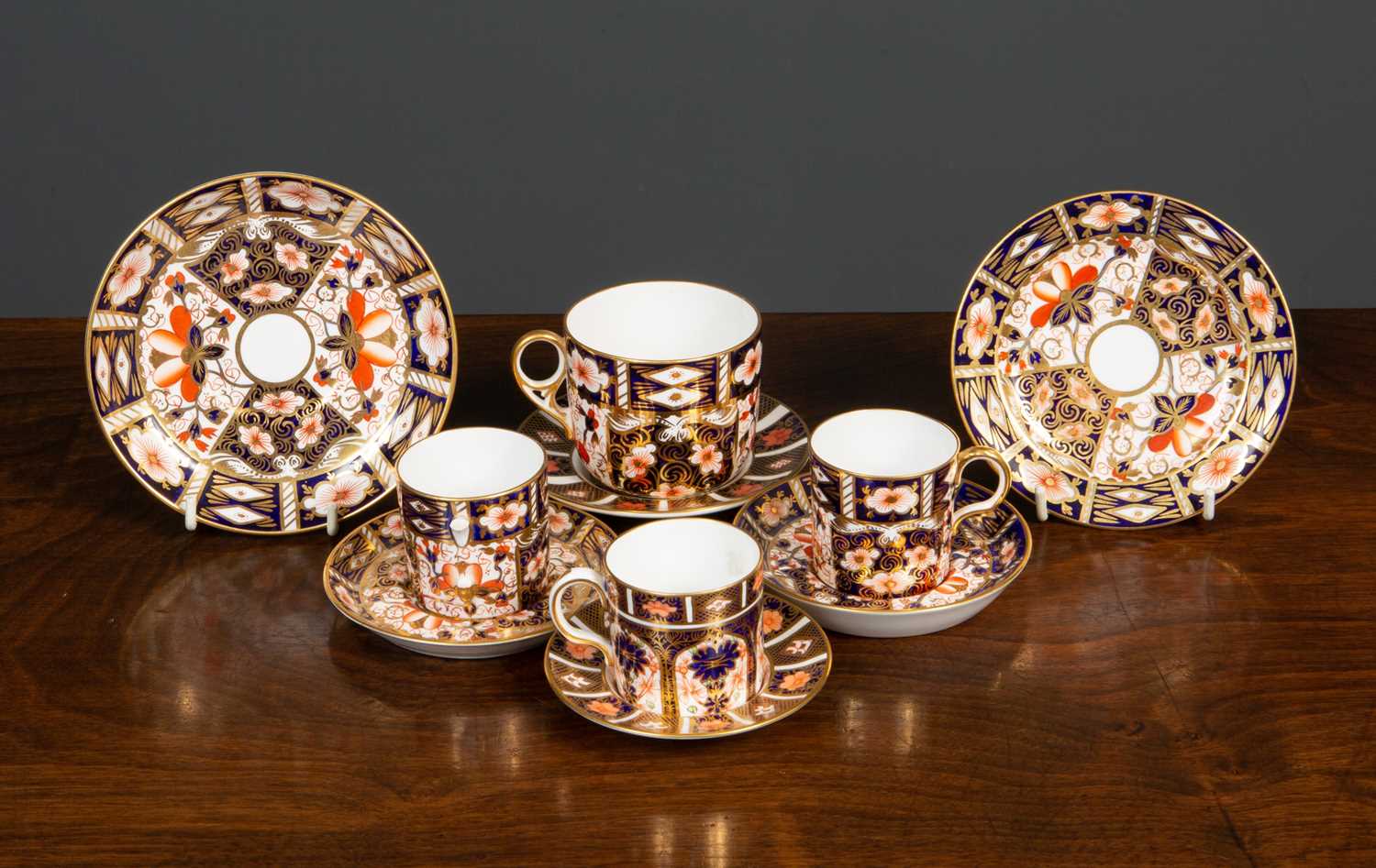 A Royal Crown Derby Imari pattern part tea set, comprising three coffee cans, one tea cup, a six