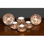 A Royal Crown Derby Imari pattern part tea set, comprising three coffee cans, one tea cup, a six