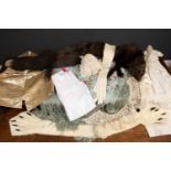 A collection of antique lace, linen and clothing to include a waistcoat, tablecloths, napkins,