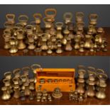 A large collection of brass weights to include Avery, Brighton & Bristol stamped, ranging from
