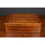 A 19th century Parquetry box by Antonio Jose D'abreu and exhibited in Medeira, 33cm wide 22cm