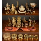 A collection of Indian ornaments to include brass lamps, figurines and animals together with a