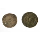 A Charles I silver shilling, Truro or Exeter, 3.5cm diameter, and a 1775 Carolus II coin, 4cm