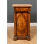 A 19th century walnut bedside cabinet with a marble top and pillar supports, 43cm wide, 40cm deep,