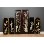 Three pairs of Chinese black lacquered screens, with applied bird and foliate decoration within a