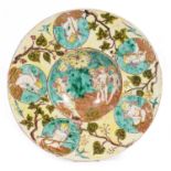 Hannah Jones for Della Robbia, a charger, with underglaze enamel decoration of cherubs, 37cm