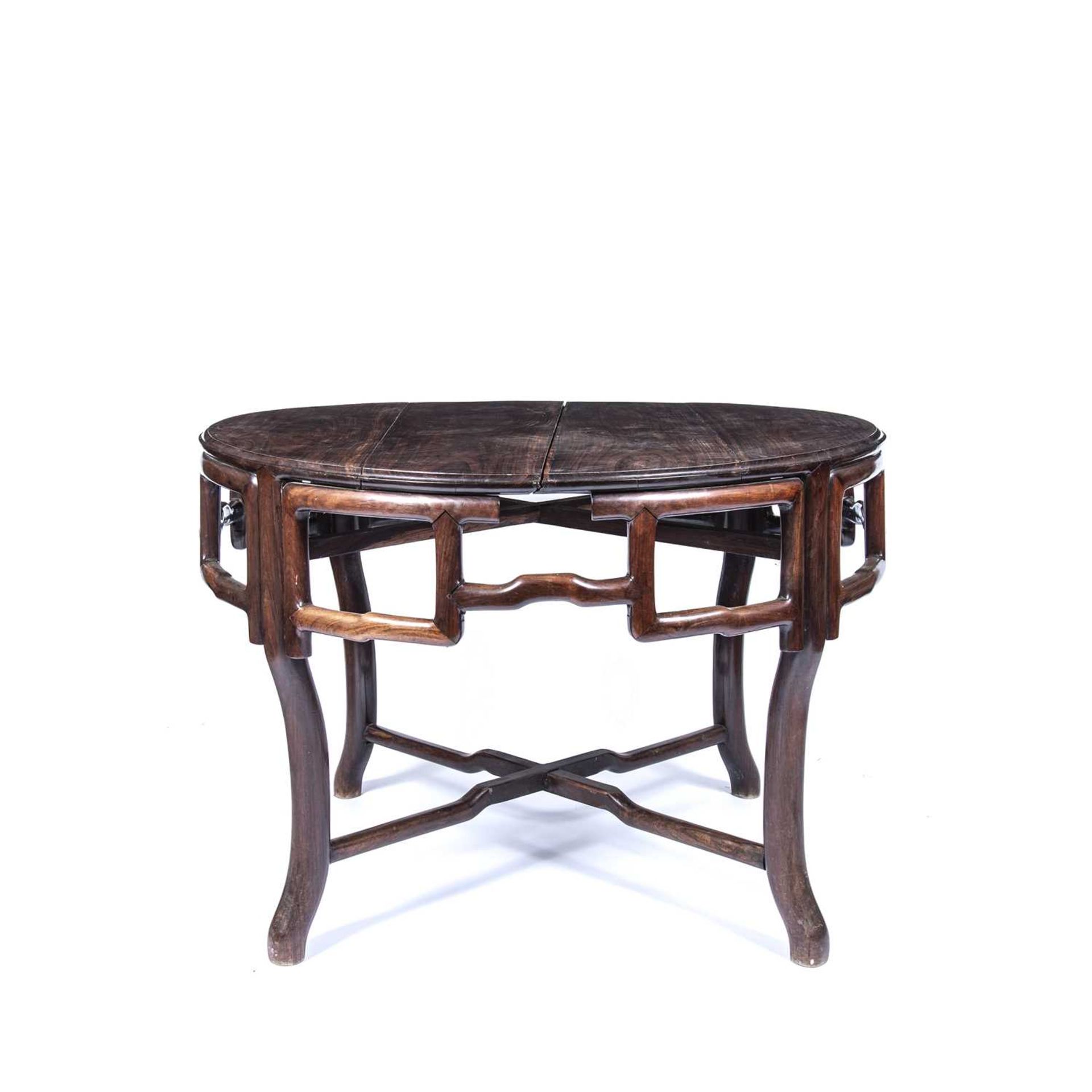 Blackwood centre table Chinese, 19th Century, on four shaped supports and with open frieze, 125cm
