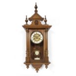 Mahogany cased wall clock the clock face with Roman numerals, and outer white chapter ring, 82cm