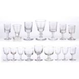 Collection of antique drinking glasses consisting of three rummers and thirteen other glasses of