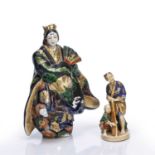 Two porcelain models Japanese, comprising of a large figure of a geisha dressed in traditional