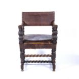 Oak frame leather armchair in the 17th Century style, carved front figural supports, 85.5cm high x