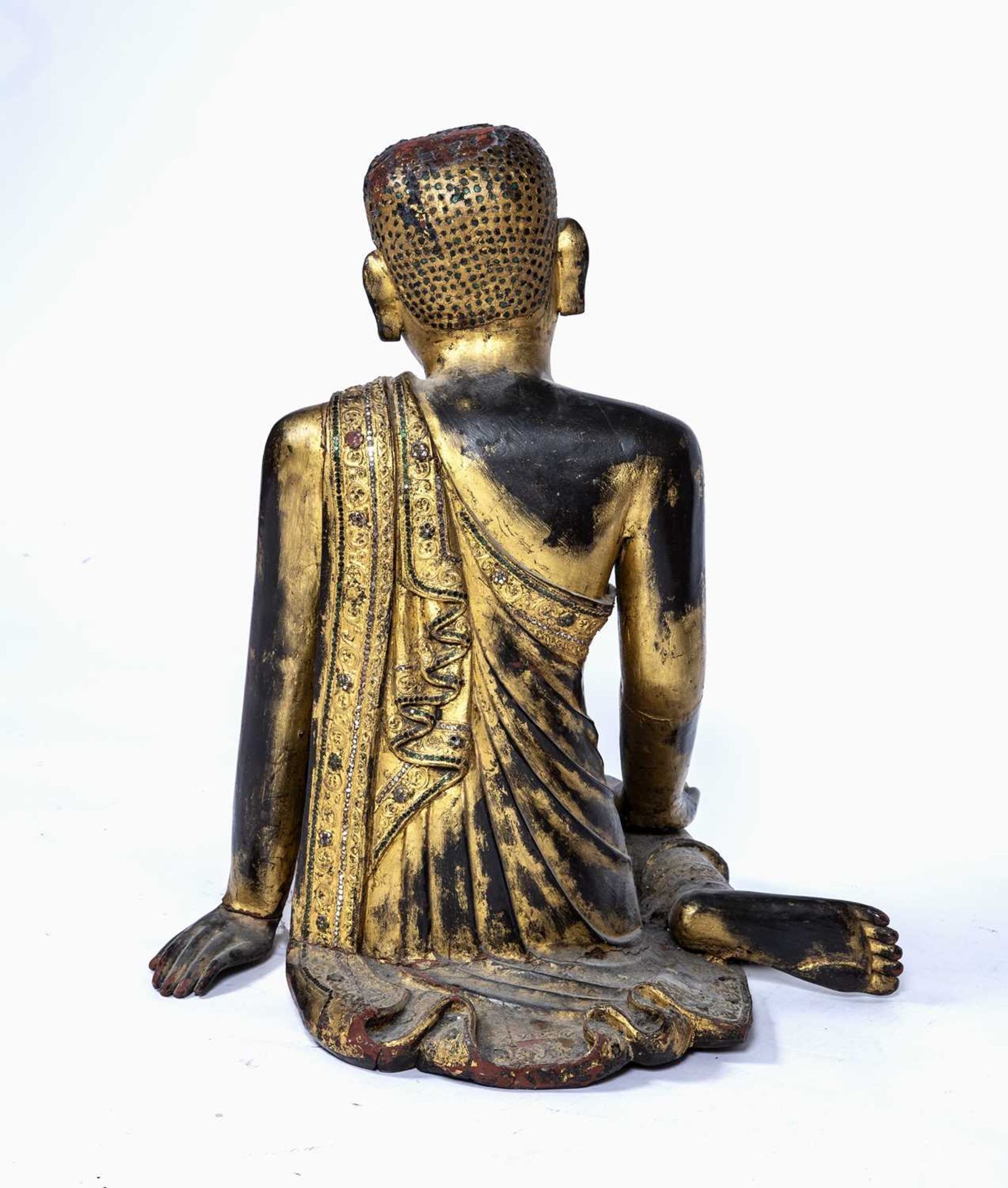 Wooden figure South East Asian, depicted seated with robes draped over one arm, with original traces - Image 4 of 5