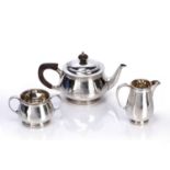 Silver three piece bachelors teaset the teapot having wooden finial and handle, with inscription