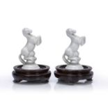 Vienna porcelain (Contemporary) pair of blanc de chine figures of miniature rearing horses,