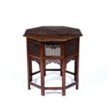 Indian octagonal table with brass inlay in the Moorish style, 60cm wide x 61cm highSome losses,