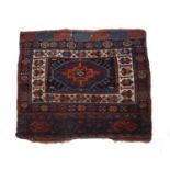 Pair of blue ground bag faces Kurdish, with central medallion and foliate designs, 78cm x 107cm