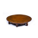 Oak lazy susan Victorian, on four turned supports, 55cm diameterWear and marks due to the age and