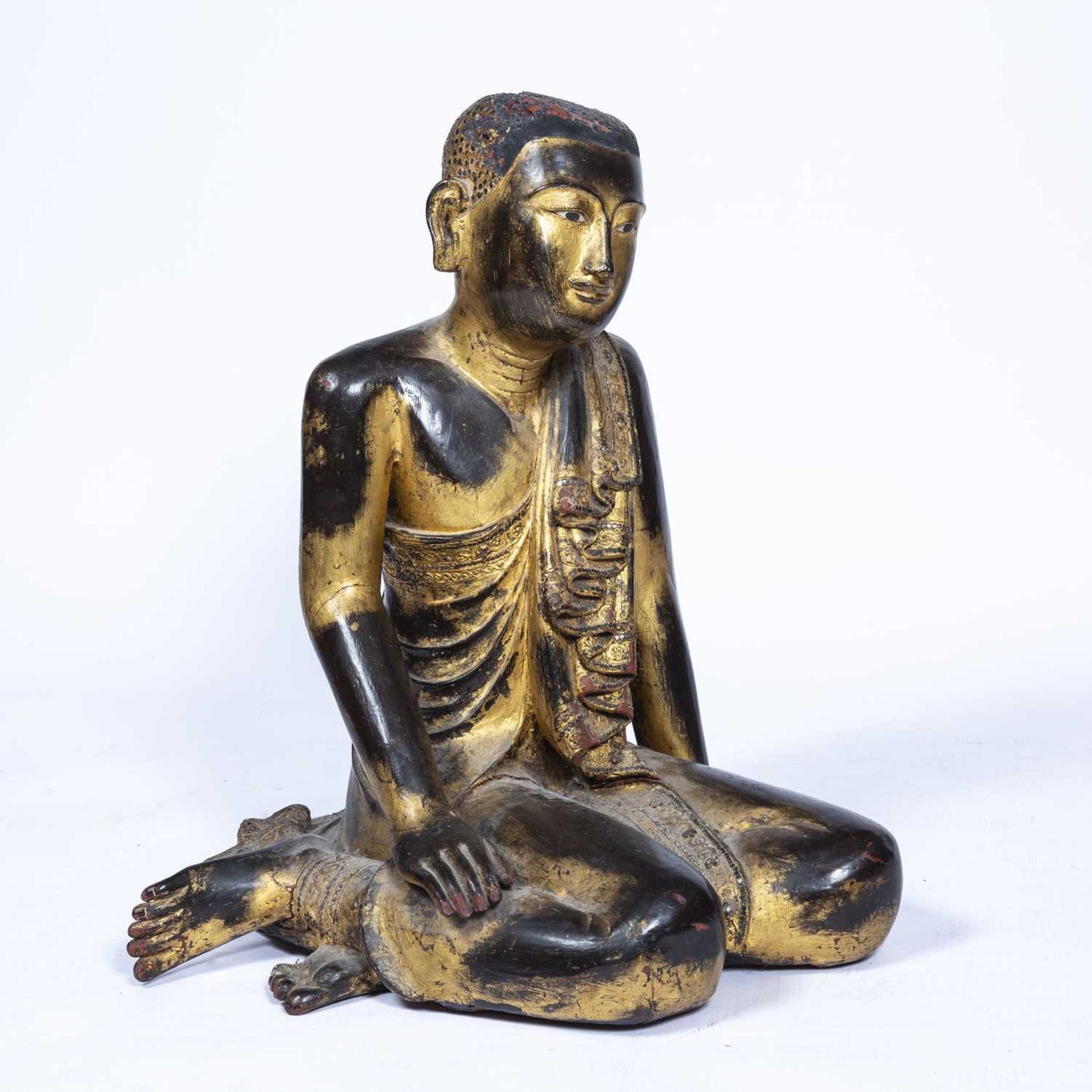 Wooden figure South East Asian, depicted seated with robes draped over one arm, with original traces - Image 2 of 5