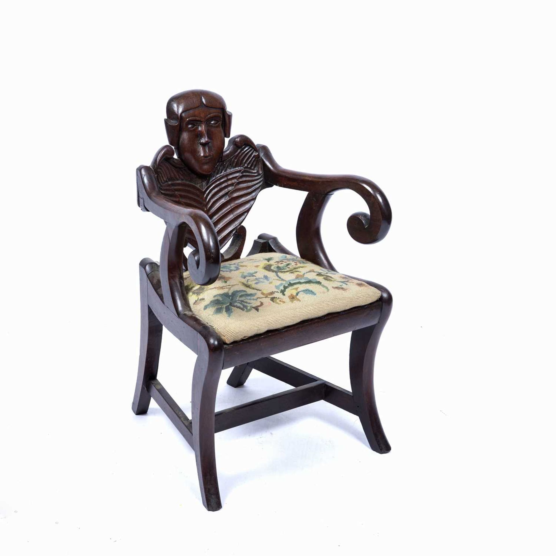 Carved childs chair with a skeleton back on sabre legs with a drop in seat, 64 cm high x 39cm - Image 2 of 4