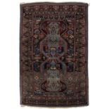 Caucasian rug with shaped central medallion and foliate border, Seichur design with old carpet label