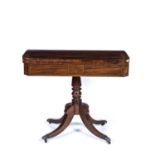 Mahogany and crossbanded card table 19th Century, with splayed supports and brass paw castors,