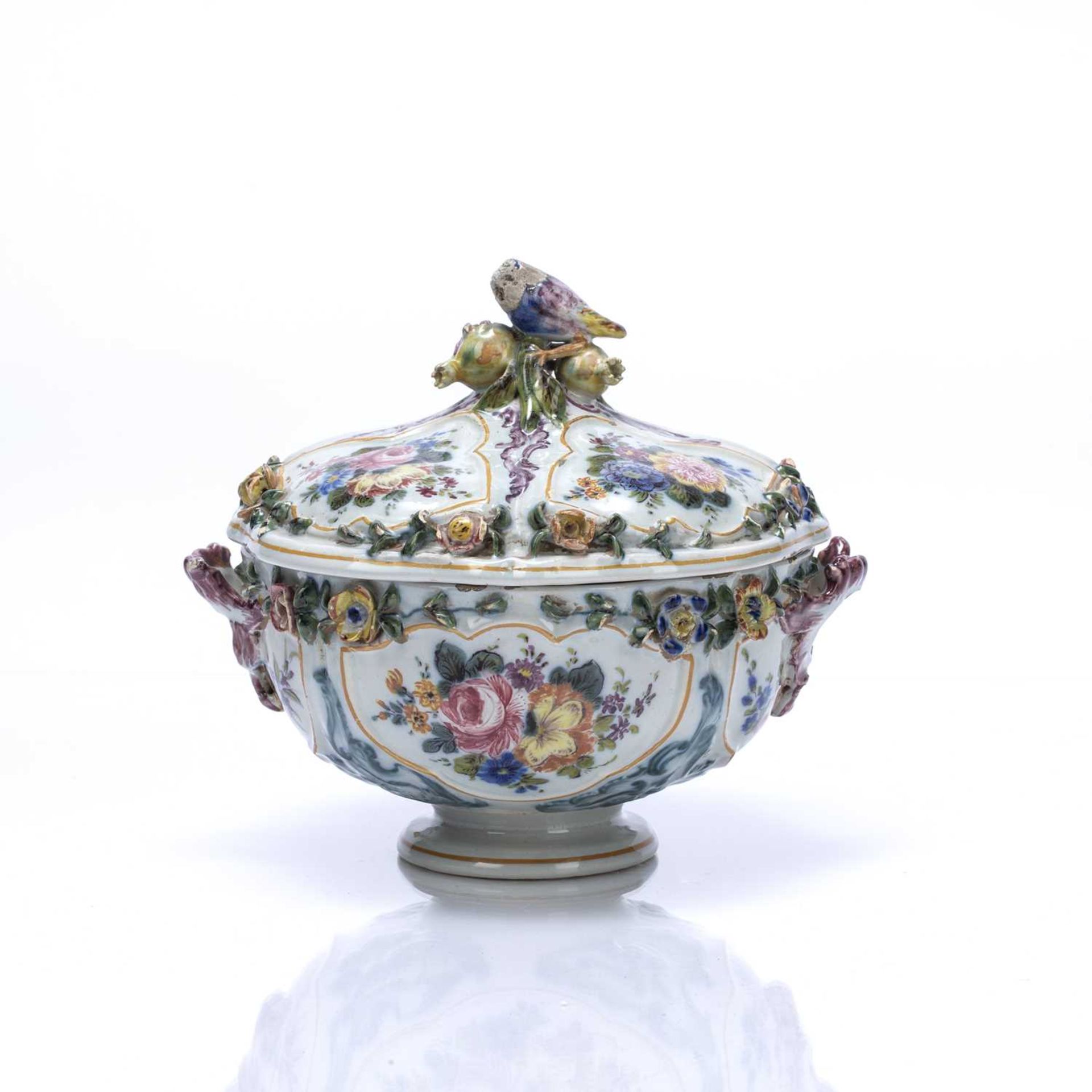Nove faience bowl and cover Italian, 19th Century, decorated with encrusted flowers around the rim