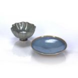 Junyao dish Chinese with a speckled blue glaze, 13cm across together with a Guan type petal shaped