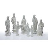 Eight blanc de chine porcelain models of Guanyin Chinese, 20th century, modelled in various