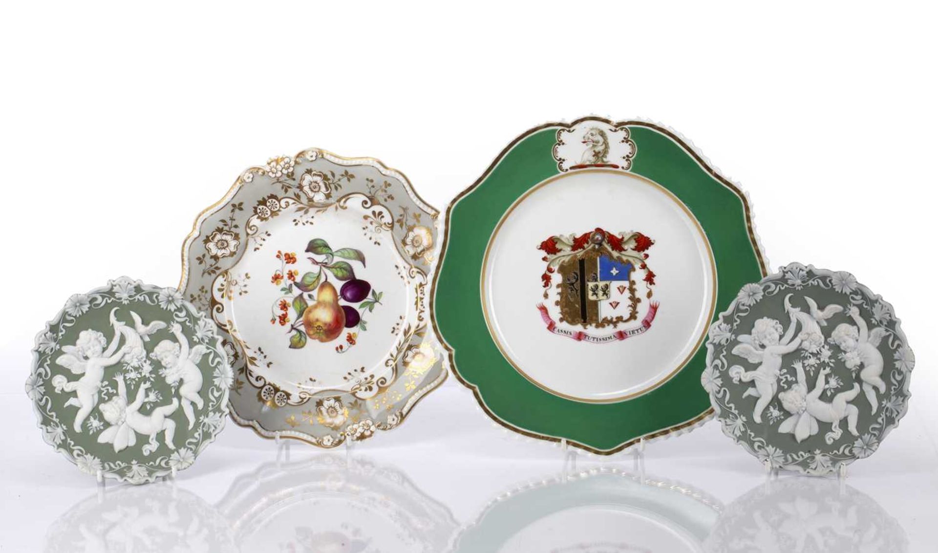 Collection of ceramics comprising of a pair of pâte-sur-pâte style cabinet plates, decorated with