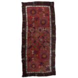 Khirgiz felt rug Central Asian, of red ground with traditional stylised decoration, 303cm x