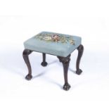Mahogany stool 19th Century, with tapestry seat on ball and claw feet, 55cm x 48cm x 43cmAt present,