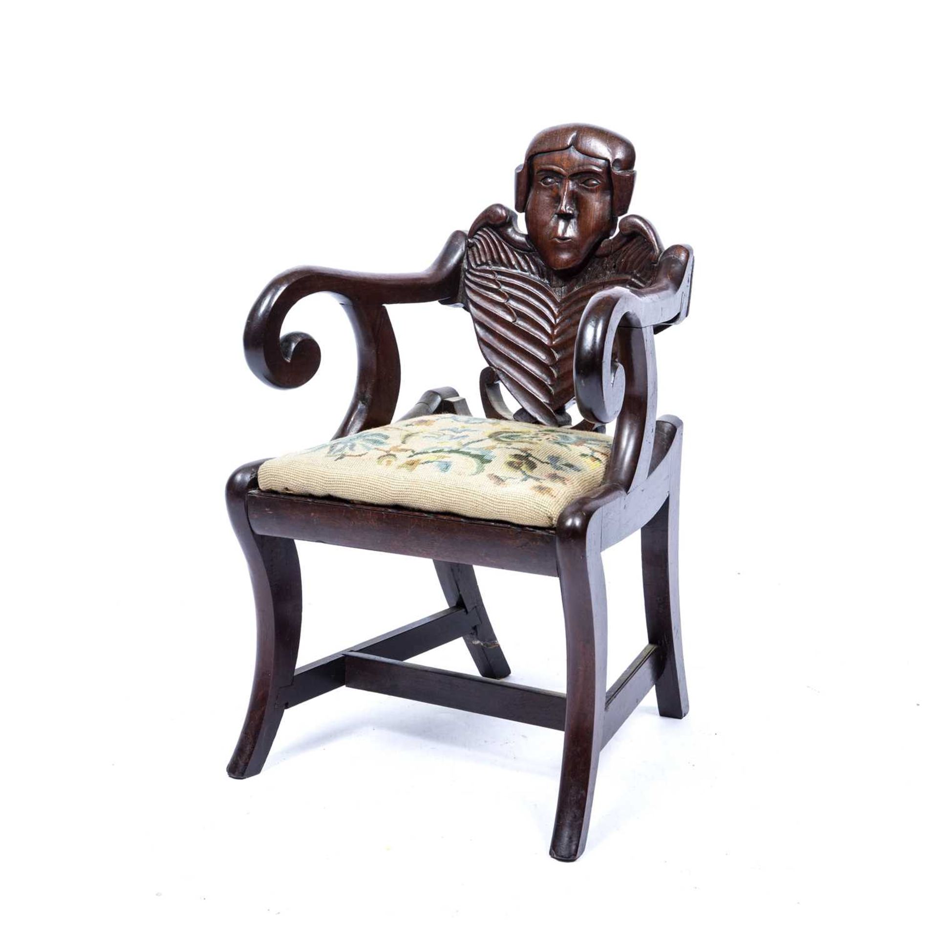 Carved childs chair with a skeleton back on sabre legs with a drop in seat, 64 cm high x 39cm - Image 3 of 4